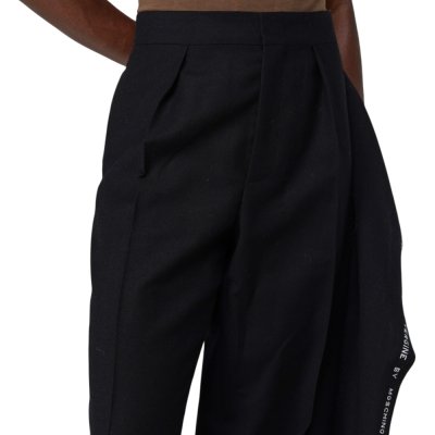 THE PLEATED RUFFLE-DETAIL TROUSERS